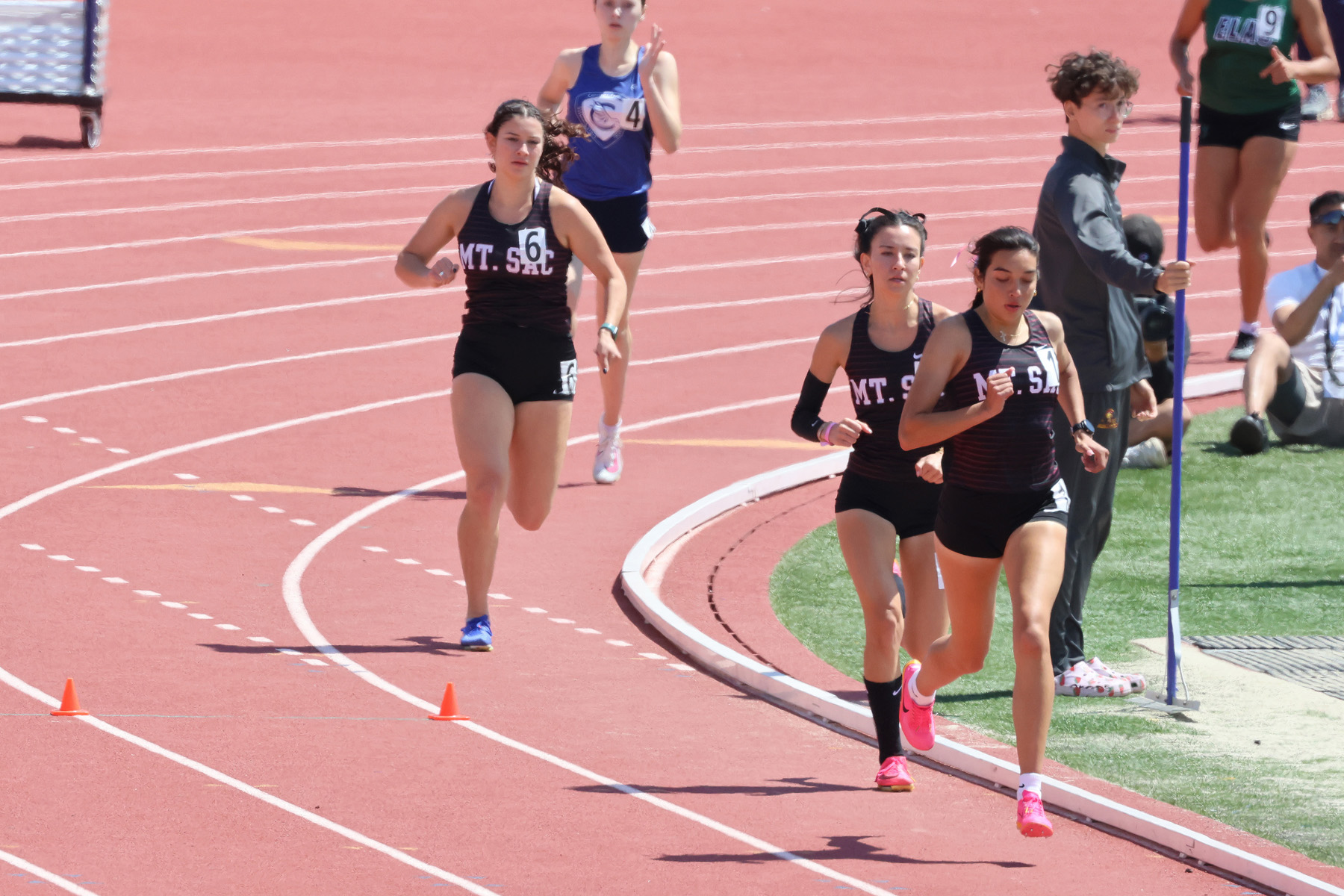 Kahlai Cruser (middle) wins the 800 meters at the SCC Championships (photo by Richard Quinton).