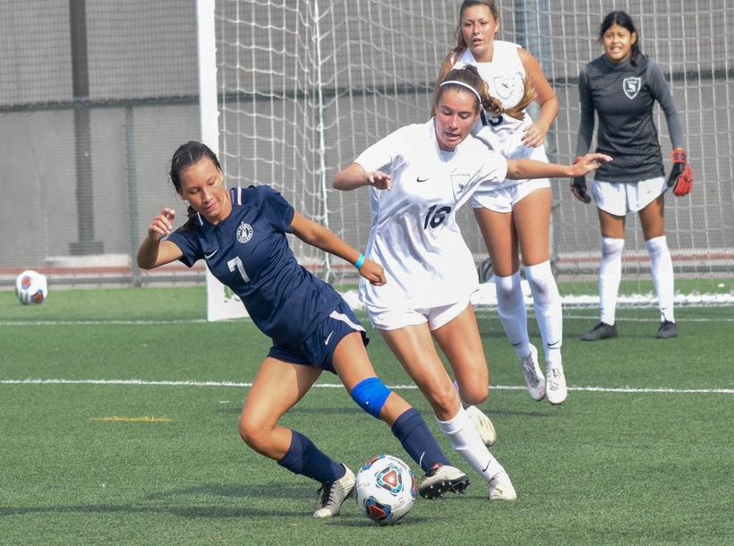El Camino College (Julia Ausland with ball) wins its first SCC women's soccer title in 22 years.